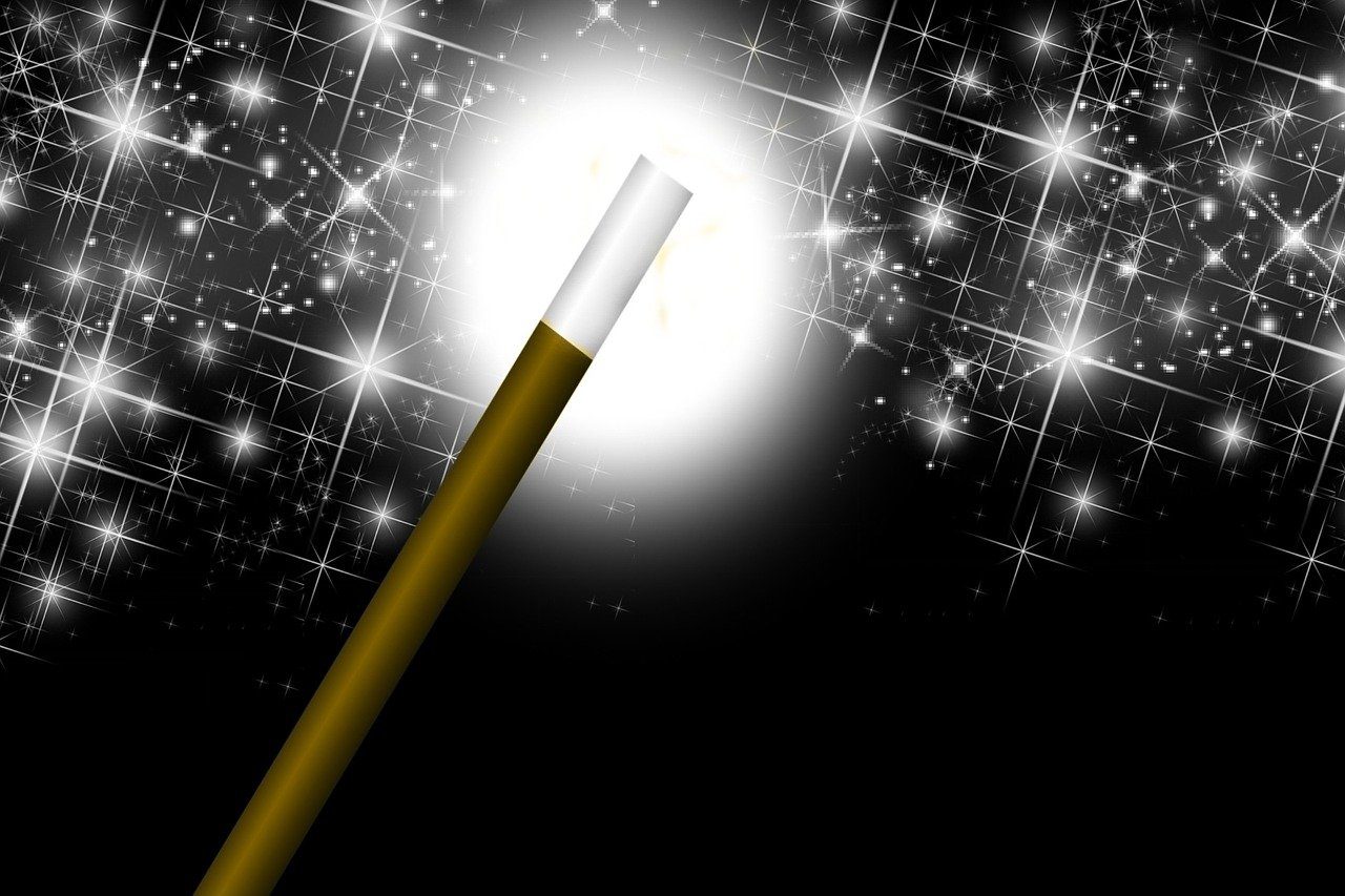 A CGI magic wand with stars and sparkles around, as if casting a spell